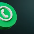 ícone do WhatsApp sobre um fundo escuro