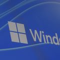tela de um computador exibindo o logo do Windows 11