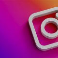 logo do Instagram sobre um fundo com as cores da rede social