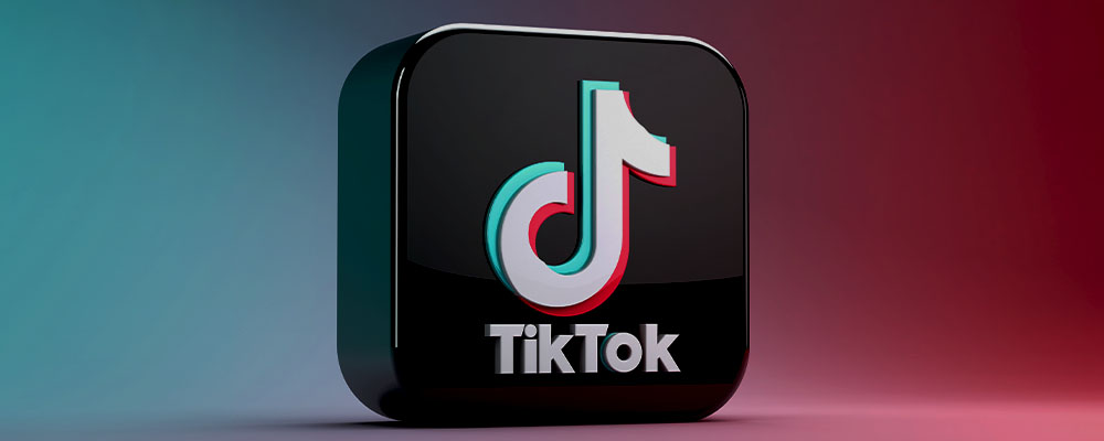 logo do TikTok em um fundo rosa e azul