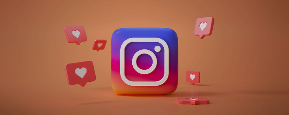 logo do Instagram rodeado por balõezinhos de likes
