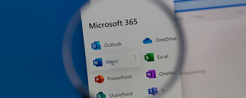 lente de aumento sobre o logo do Microsoft 365 e vários aplicativos do Pacote Office