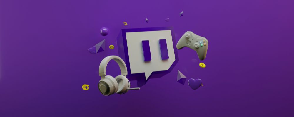 Logo da Twitch com vários gadgets de videogame ao seu redor.
